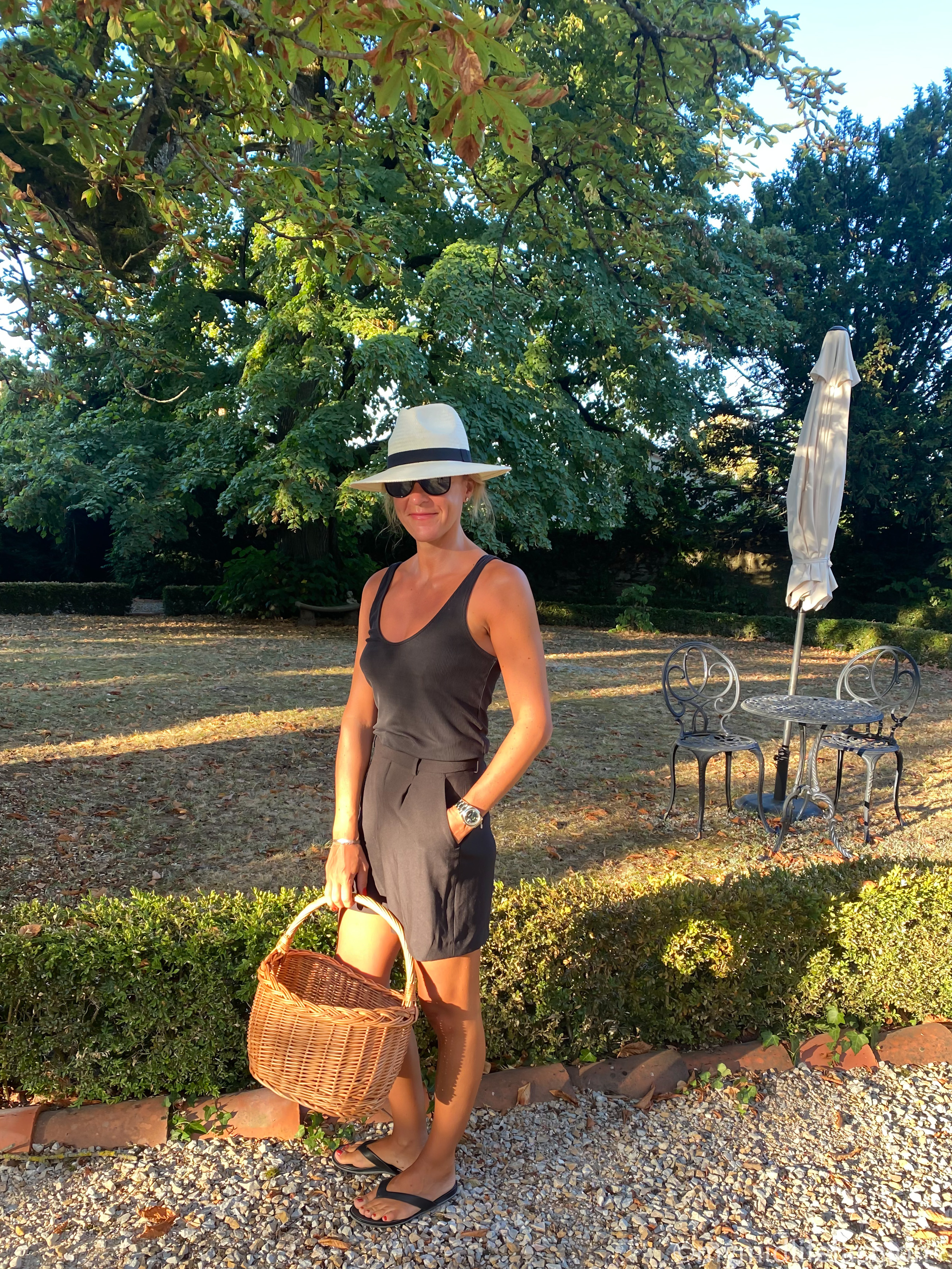 my midlife fashion, Zara Panama hat, and other stories ribbed vest top, Zara shorts, wicker shopping basket, fit flop leather fit flops