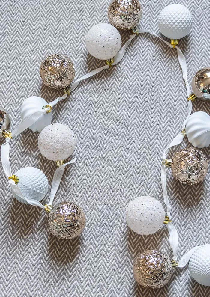 gold and white ornament garland