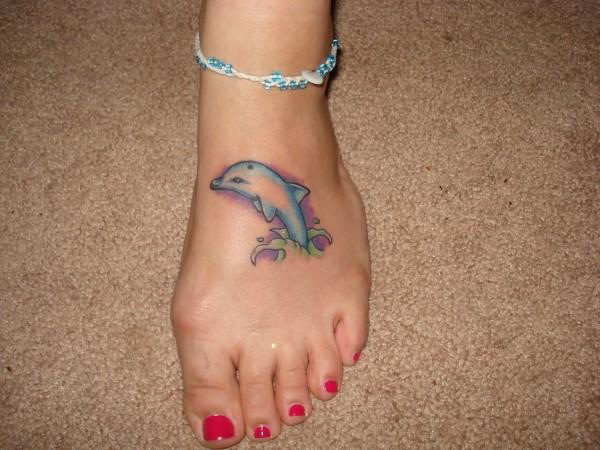 Dolphin Tattoos Design for foot Dolphin TattoosBoth male and female tattoo