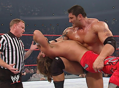 WWE Armageddon 2003 Review - Batista puts Shawn Michaels in a back breaker