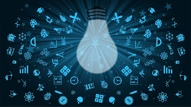 A collection of images representing thought, with a lightbulb in the middle. Blue images on a dark background.