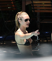 Candice Swanepoel hot in  a black bikini