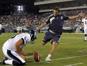 Gonzalo Higuian in Philadelphia shooting a NFL ball