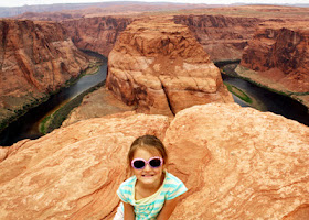 Tessa at Horseshoe Bend in Page. I wasn't about to set her closer to edge to get the better shot below.