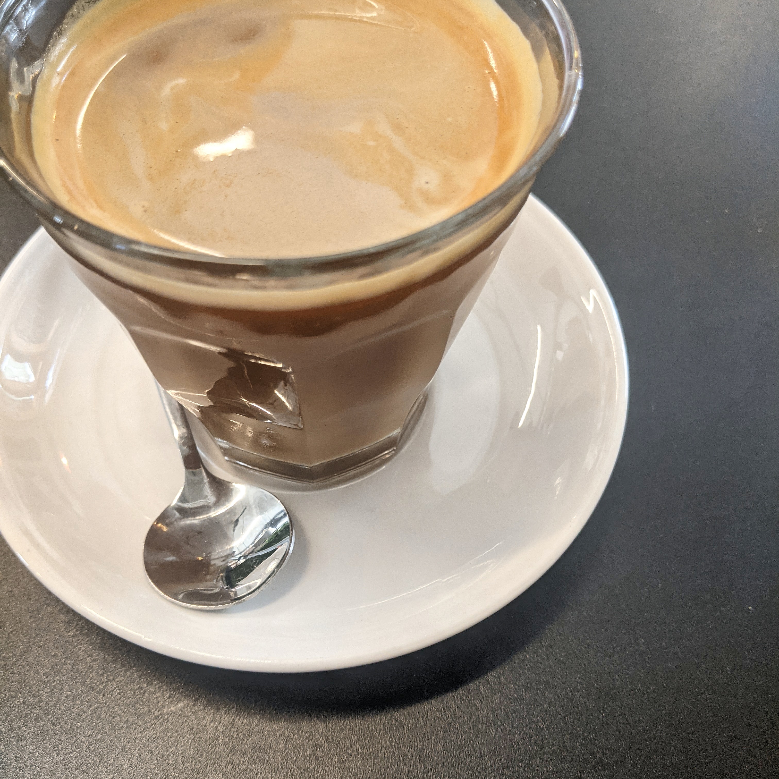 glass cup of coffee at cafelix in tel aviv