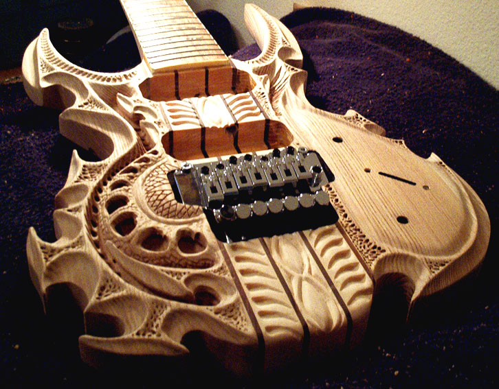 Simply Creative: Incredible Carved Guitar