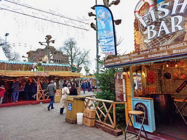 Stalls with food and drinks at Winterland Christmas Market in Hasselt