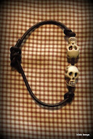 LoveLea's leather 2 skull bracelet with sliding knot