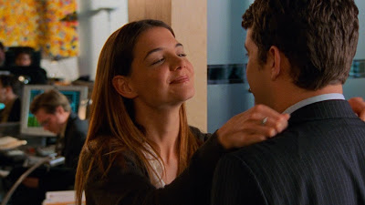Joey smirking as she adjusts Pacey's tie and collar