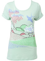 Oversized tee with garden scene print and applique detail on front. 100% Cotton. Machine washable.