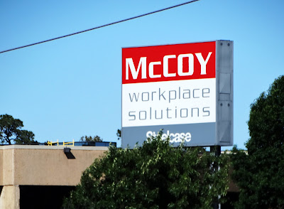 McCoy workplace solutions (sign)