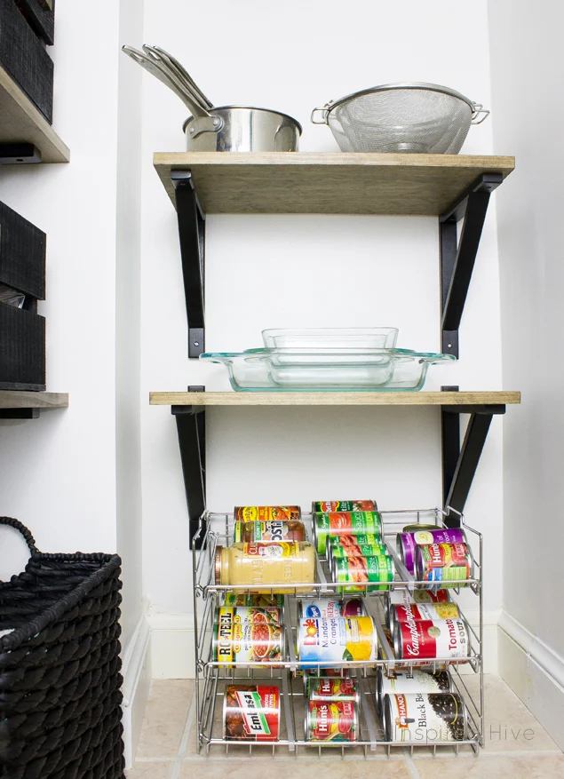 Pantry organization tip: Put the can rack on the floor to free up shelf space!