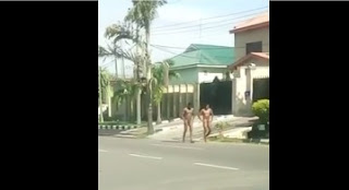 SHOCKING: 2 Ritualists Spotted Walking Full Nude  On Abuja Street In Broad Day Light; Watch Video