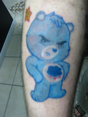 panda bear tattoos. blue ear tattoo girls