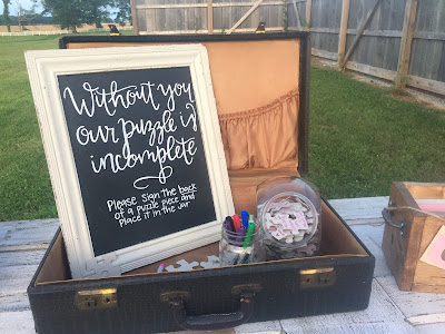 Rustic barn wedding meets vintage fairy tale. Meadow Creek Farm North Alabama Wedding Venue. Vintage Beauty and the Beast inspired wedding reception decoration ideas. Guest book sign in table. Sign a puzzle piece