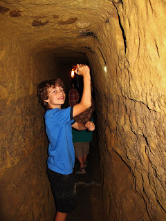 Children love the underground city tour in Chiusi, Tuscany, Italy