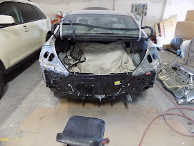 Honda Civic during auto body repairs at Almost Everything Auto Body.