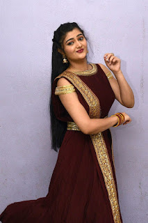 Akshitha Beautiful Photos In Maroon Color Long Dress