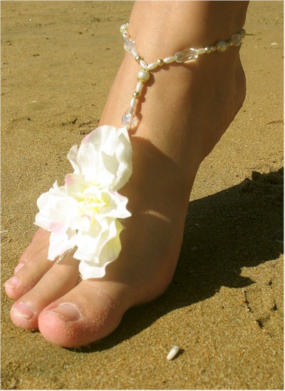 The Barefoot Beach Shoes Barefoot Sandals displayed were designed by 