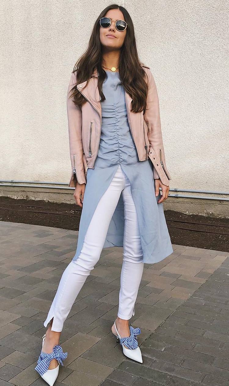 trendy fall outfit with a pink moto jacket : blue shirt dress + white skinnies + heels