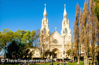 During our first walk from Union Square to Pier39 through China Town, we come across this beautiful church on our way. This was just next to the China town. This was just across the road and we planned to take a halt before continuing our walk towards Fishermen's Warf. Initially I didn't want to go inside, as a wedding was in progress. My friend Satya insisted because the wedding was probably over. And I was happy about taking a pause and going inside this beautiful church. We came across 2 other churches on this way in San Francisco , but didn't take any break. Saints Peter and Paul Church in San Francisco North Beach neighborhood in located at 666 Street, which is directly across from Washington Square and is administered by the Salesians of Don Bosco . It is known as 'La cattedrale d'Italia overt,' or 'The Italian Cathedral of the West,' and has served as the home church and cultural center for San Francisco's Italian-American community since its consecration. You may want to check more about this place on wikipedia Saints Peter and Paul Church in San Francisco is located next to China town and at a walking distance. The huge lawn in front of the church is usually full of folks doing different activities. This lawn is surrounded by 3 roads and this church on other side. There is a huge green space in front of Saints Peter and Paul Church. Lot of groups come to this place to celebrate & have fun. Many folks come with their games musical instruments etc.