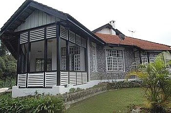 The Jelai Bungalow has a spacious verandah, as well as a chimney, which is typical in all the mock Tudor-style bungalows on Fraser's Hill. — Reza Azmi