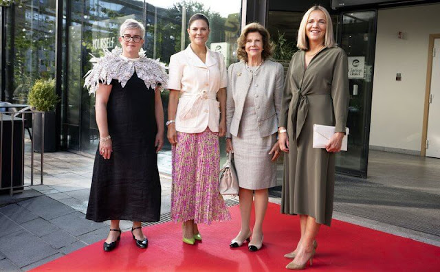 Crown Princess Victoria wore a belted short sleeve blazer by Sandro, and pink plisse pleated midi skirt by & Other Stories
