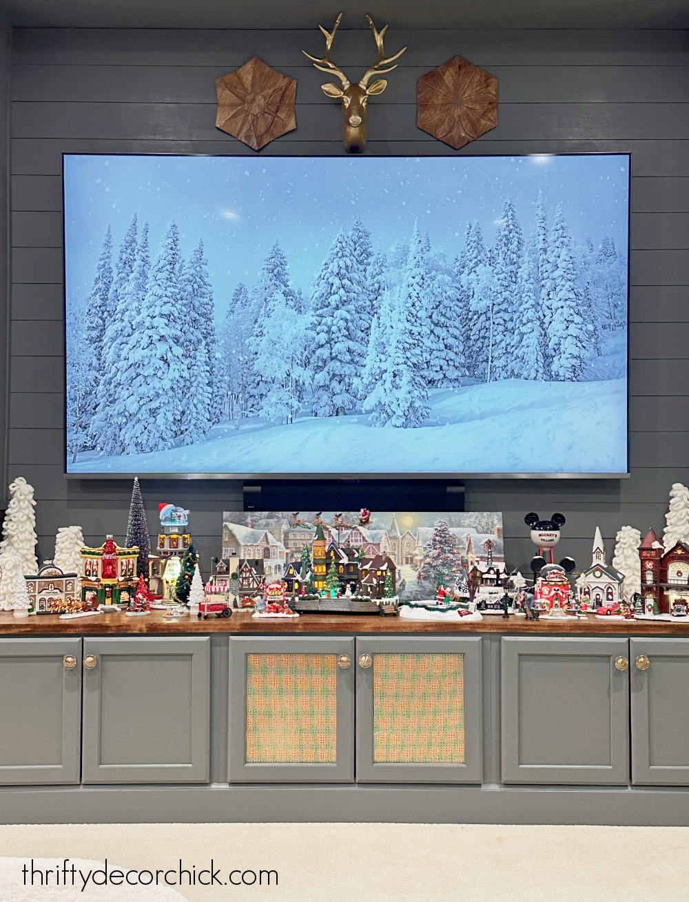 Christmas village display under TV