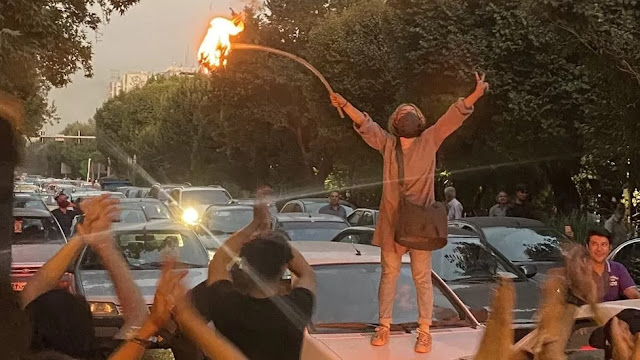 Iran protests: Women burn headscarves in anti-hijab protests