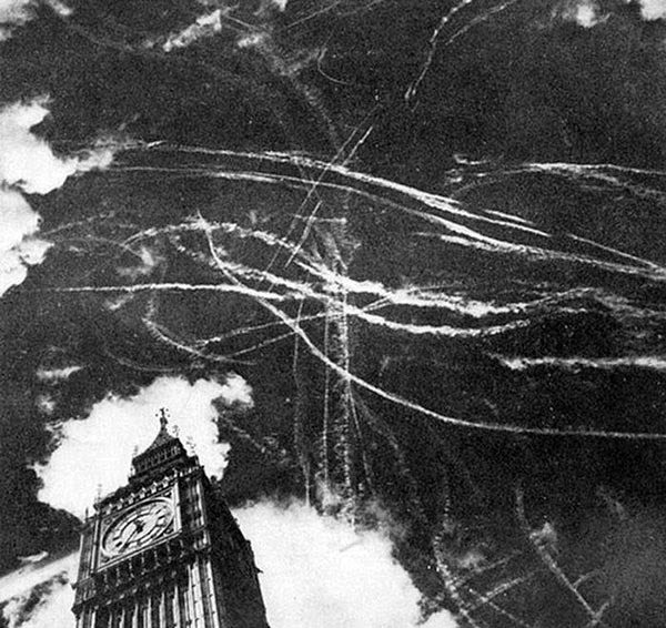 Rarest Historical Photos, That you can Never Forget. - Picture showing the dogfight between German and British planes, and The London sky after a bombing in the year 1940