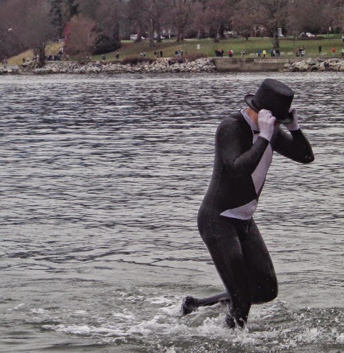 A man with black top hat escaping the waters