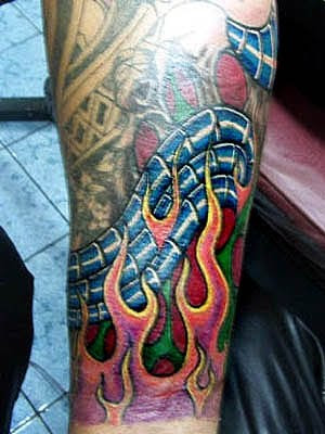 i like this flame tattoo on sleeve special designs for men
