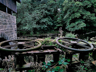 <img src="Mayroyd Mill.jpeg" alt=" image of the ruined wall near Hebden Bridge" />