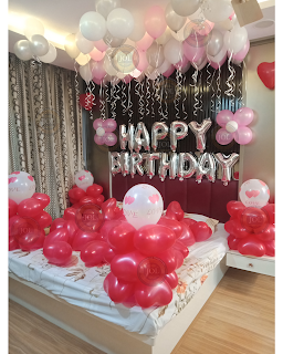 Preety pink balloons decoration at home for wifes birthday