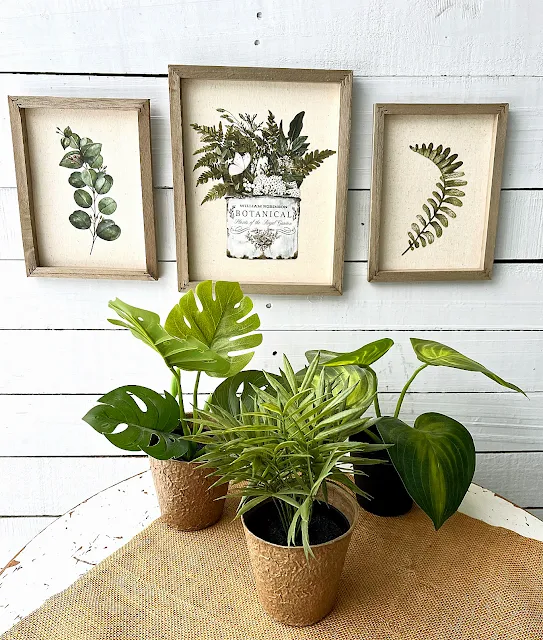 Photo of DIY framed reverse canvas botanical wall art.