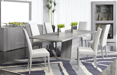 Modern gray dining room furniture with nice rug underneath