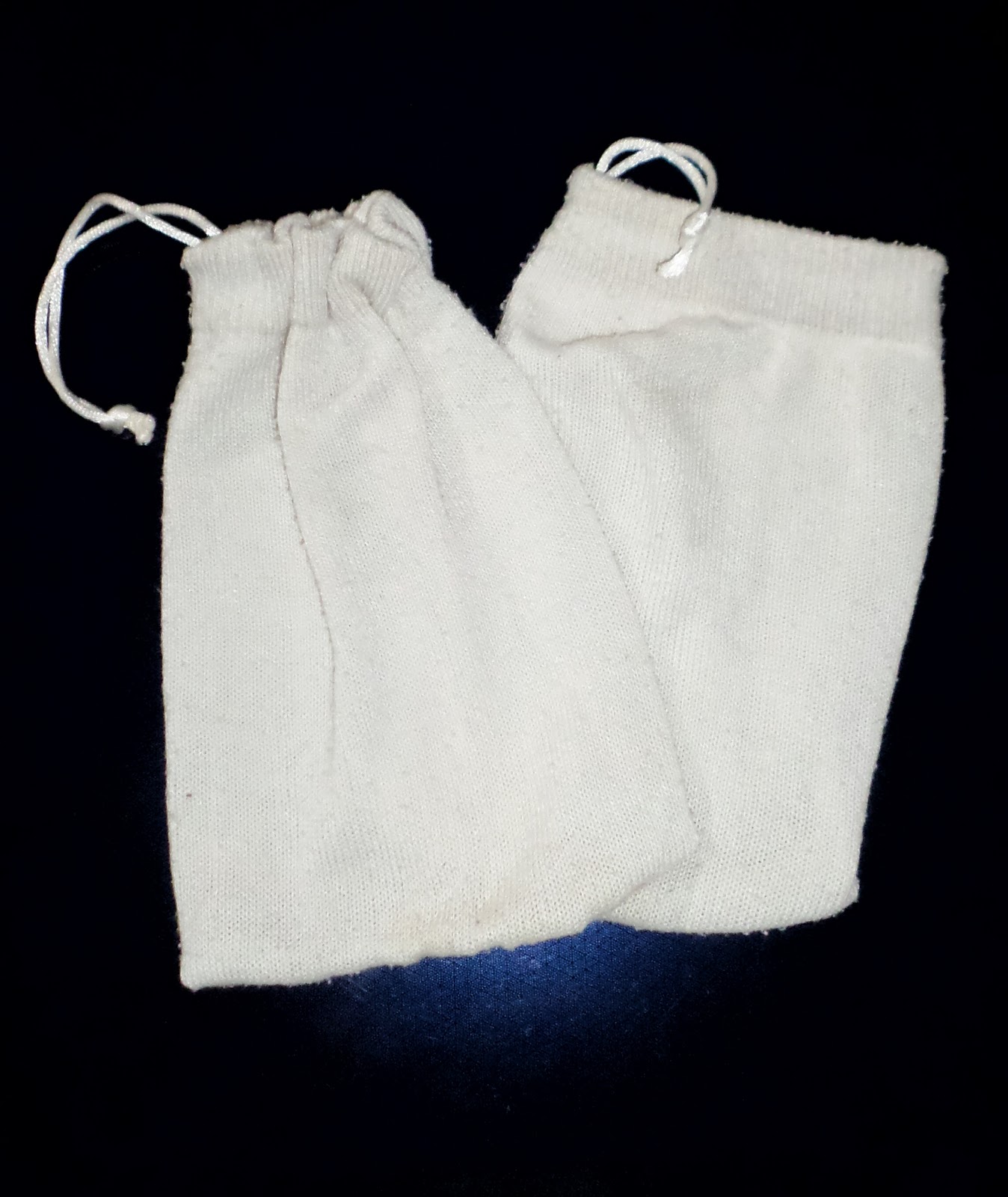 Membuat Kantong Serbaguna dari Kaos Kaki Bekas Membuat Kantong Serbaguna dari Kaos Kaki Bekas