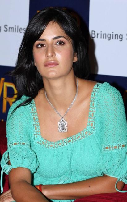 katrina kaif in a short dress ing her legs