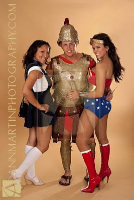 group full legnth picture of roman soldier in armor wonder woman costume and gossip girl costume