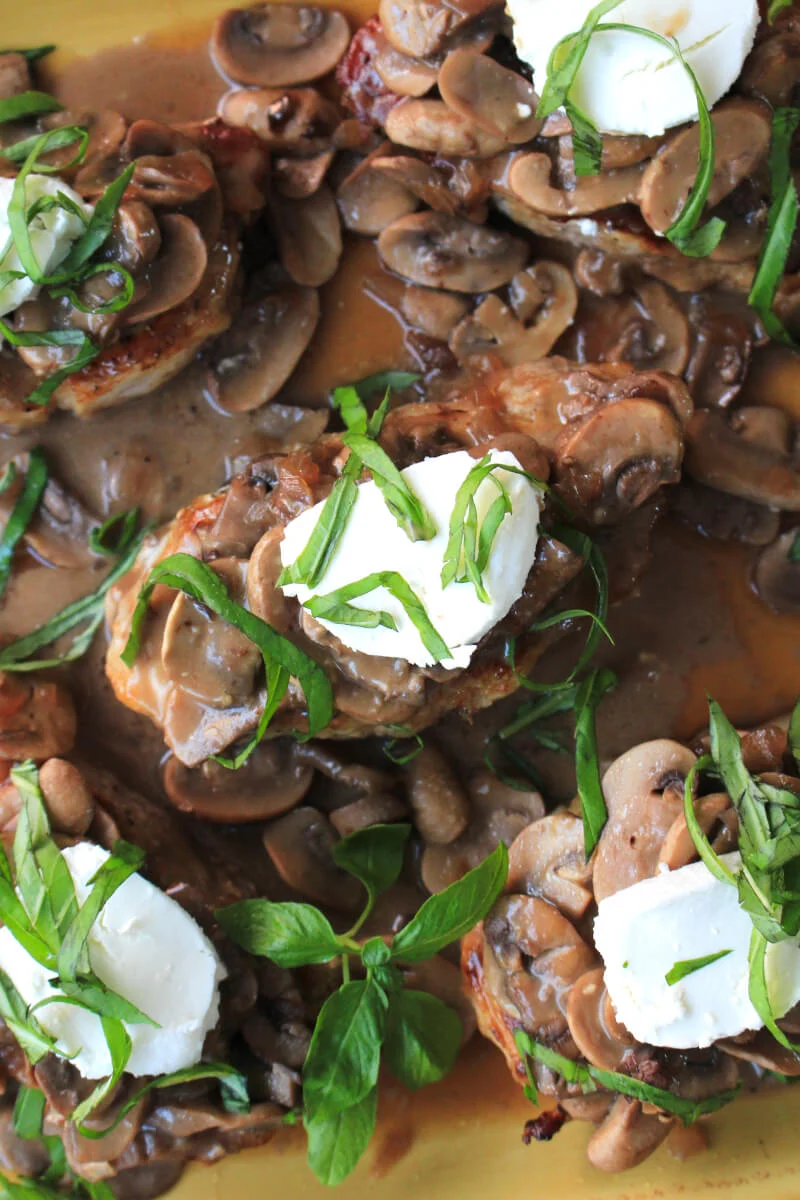 An elegant, yet easy to make main dish recipe ~ Mushroom and Goat Cheese Pork Chops!
