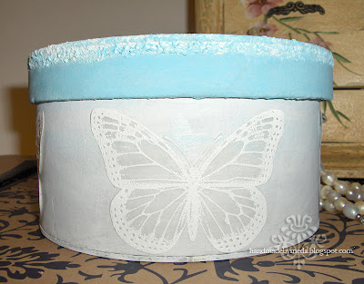 white butterfly blue box