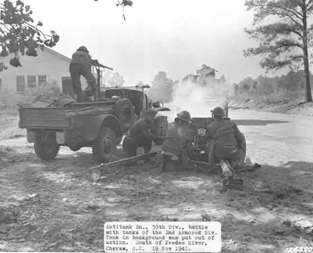 A WC-4 truck with gun mount and 37-mm artillery piece of US 30th Division, 19 November 1941 worldwartwo.filminspector.com