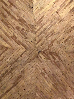 Arched stone ceiling in restaurant in Spello, Umbria, Italy