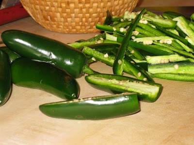 Thinly slice jalapeño chilies