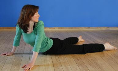 TIRYAKA BHUJANGA ASANA OR TWISTING COBRA POSE