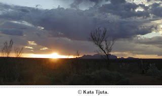 Photographer unknown: sunset in central Australia, with dramatic clouds over Kata Tjuta