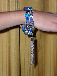 the completed bracelet with dragon spacer and tassel