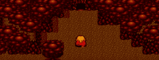 Flame colored cave with  light brown floor colour with blonde hair knight with red cape on facing a cave entry point