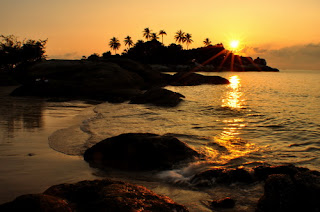 matahari terbit di pantai parai