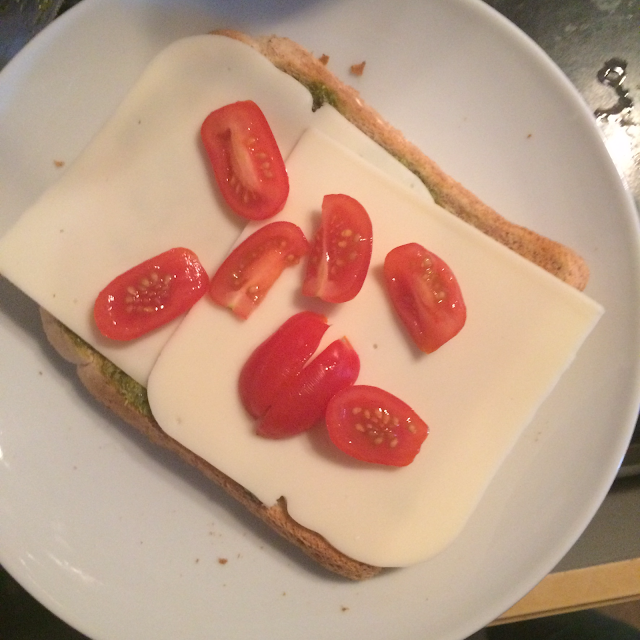 Vegan tomato and pesto cheese grill sandwich